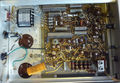Bottom internal. Orange capacitor is not original, serving the role of C298, which presumably failed.