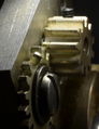Bent tooth on 1L40 tuning gear provides limit stop in both directions.