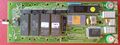 Top view of the digital board. It contains a microcontroller with typical RAM/Rom combination, but also a voltage reference and 2 proprietary ICs for signal processing.