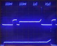 Full pulse pattern of a 7S12/S-52 in real time (top trace) and sampled (bottom trace) shown simultaneously on 7844. 7S12 trace at slowest possible sweep.