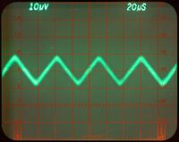 15 μVp-p triangle wave measured through 7A22. Using variable-persistence storage mode on a 7613 for noise filtering